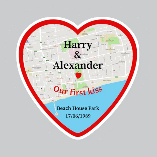 Heart-shaped map sticker with 'Harry & Alexander' and 'Our first kiss' text