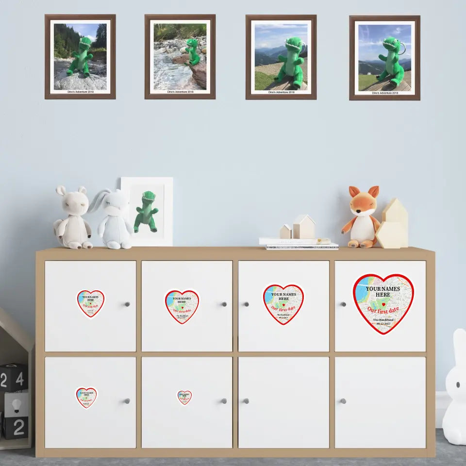 Personalised heart map stickers displayed on storage unit in multiple sizes with custom names and date