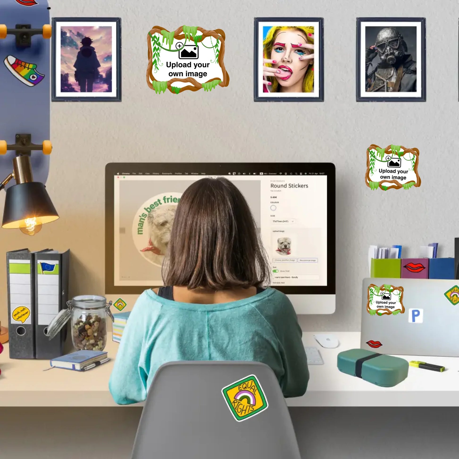 Person sitting at a desk designing personalised stickers online with stickers and wall stickers decorating home workspace