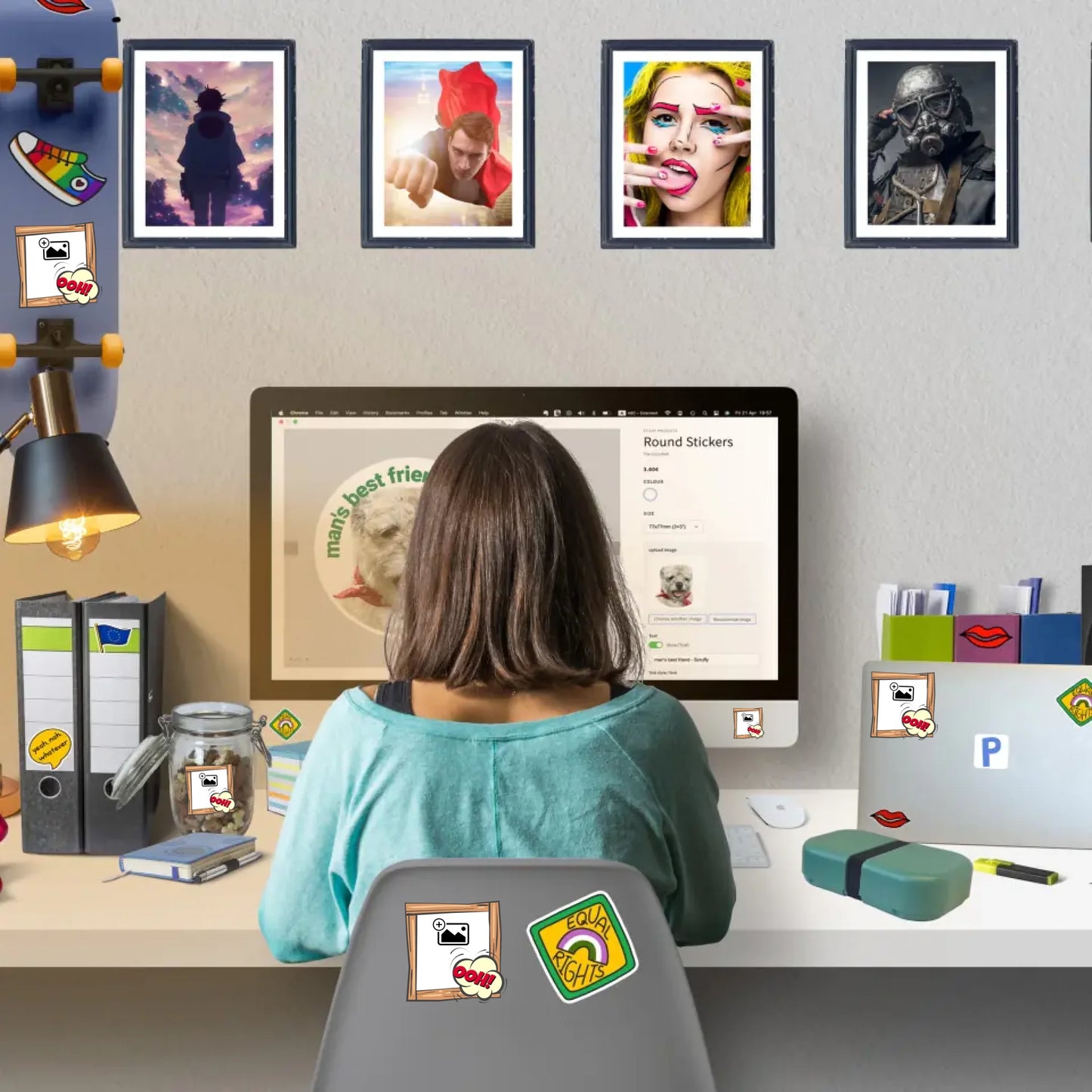 Woman sitting at a desk ordering personalised stickers online with stickers and wall stickers decorating home workspace
