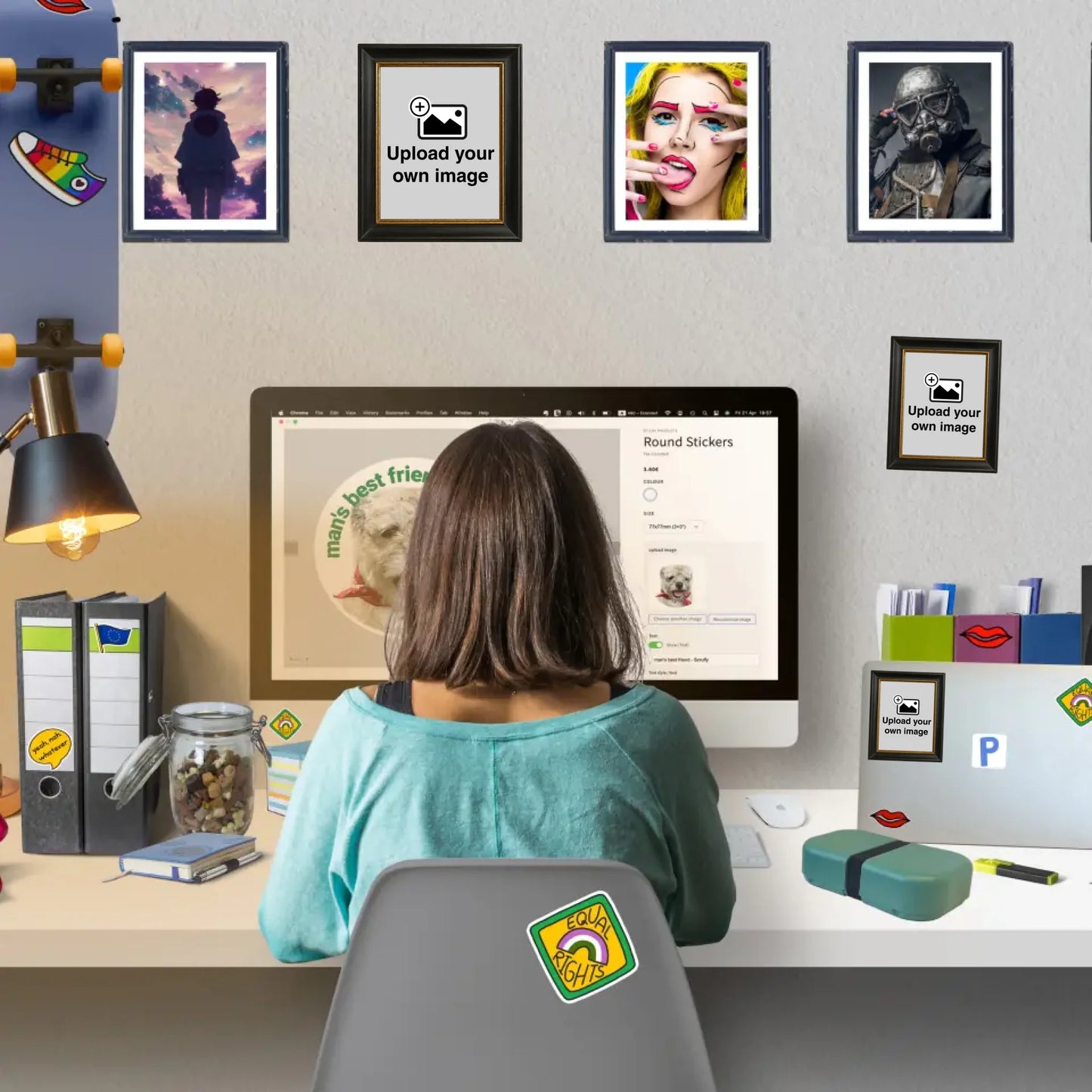 Workspace with custom framed wall stickers displaying personalised photos and artwork in printed frames