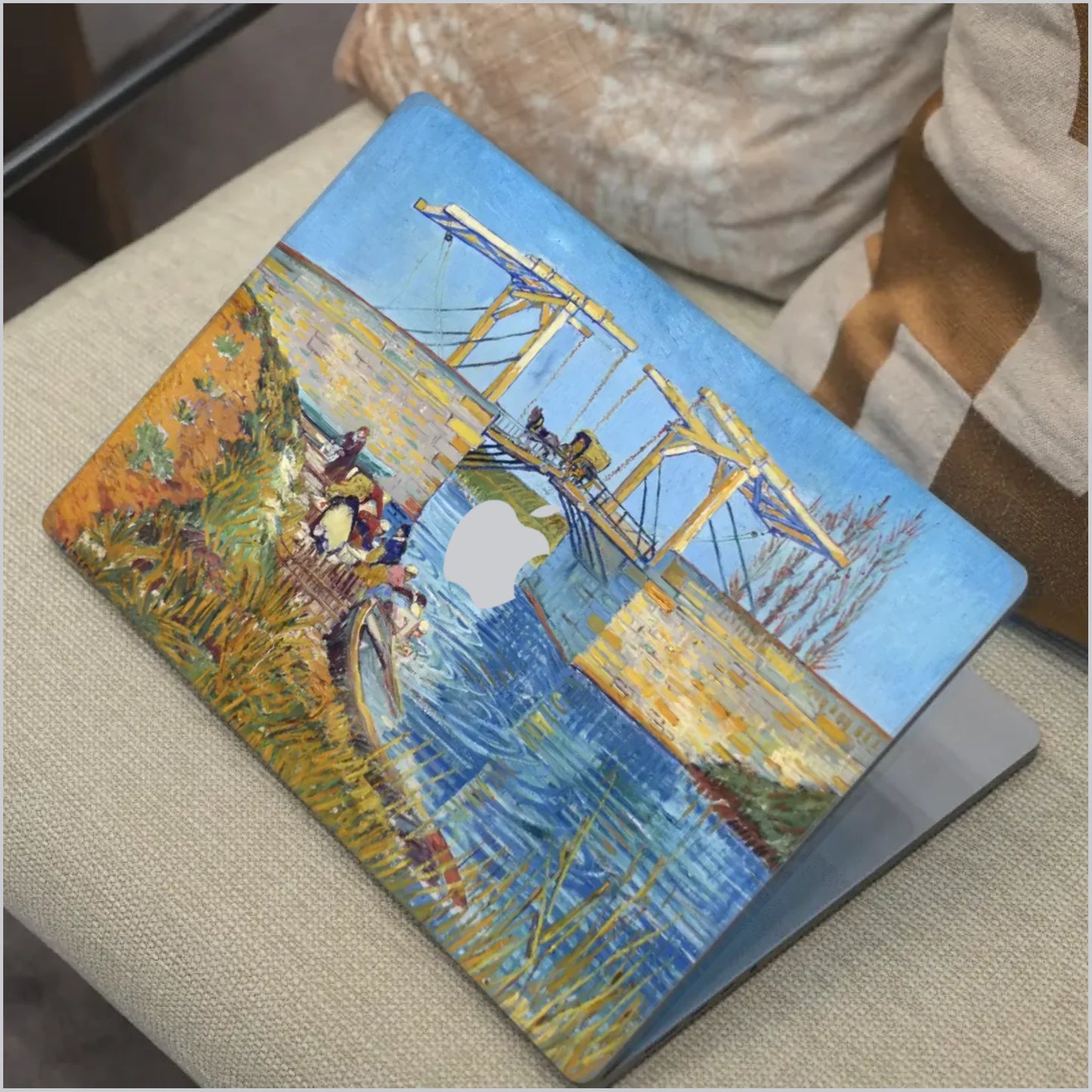 Van Gogh Langlois Bridge at Arles MacBook skin with colourful canal bridge artwork in blue and gold tones